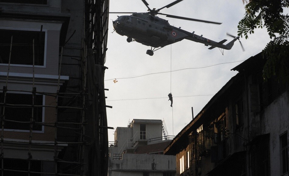 The dramatic scenes were beamed live on television as Indian commandos battled the heavily armed gunmen and guests tried to escape out of windows and rooftops. Getty Images The dramatic scenes were beamed live on television as Indian commandos battled the heavily armed gunmen and guests tried to escape out of windows and rooftops. Getty Images